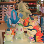 Suicune and Tyranitar "Giants" on display in-store